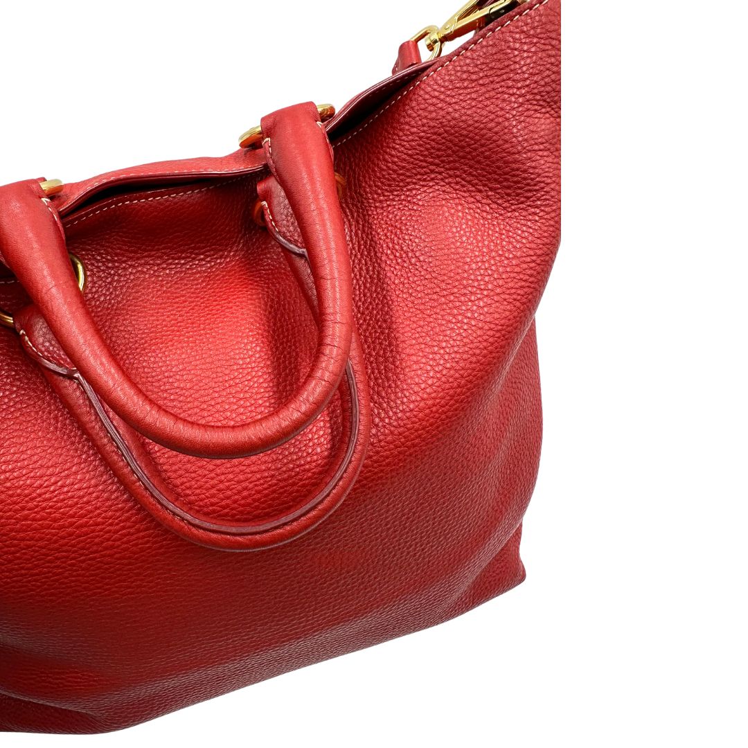 Borsa Prada in pelle martellata rossa, di lusso, originale, ottime condizioni, usata.