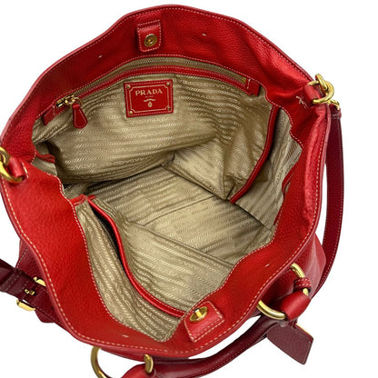 interno Borsa Prada in pelle martellata rossa, di lusso, originale, ottime condizioni, usata. 