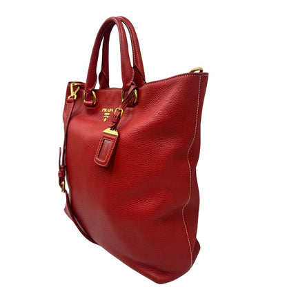 lato Borsa Prada in pelle martellata rossa, di lusso, originale, ottime condizioni, usata. 
