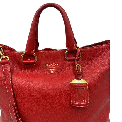 Borsa Prada in pelle martellata rossa, di lusso, originale, ottime condizioni, usata.