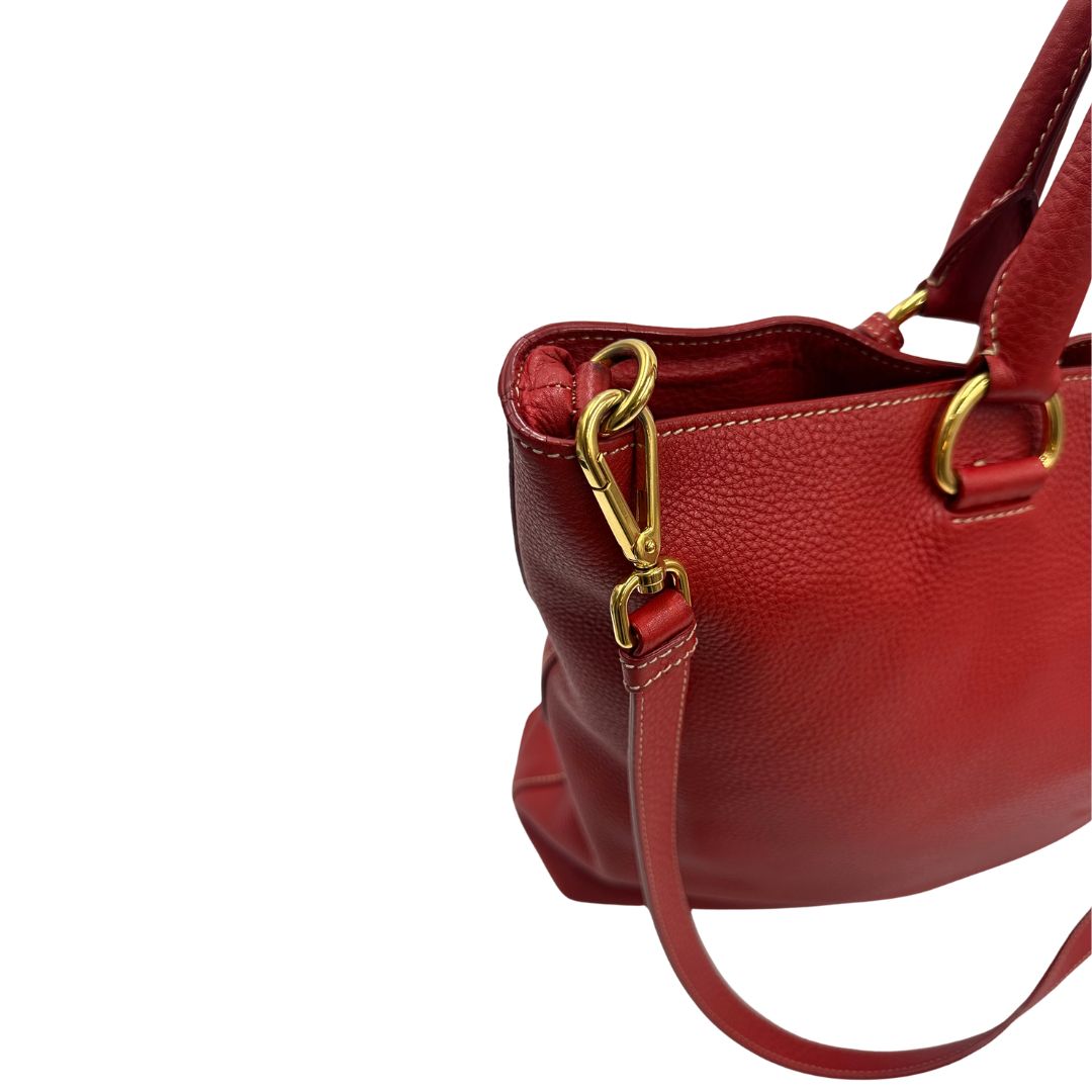 Borsa Prada in pelle martellata rossa, di lusso, originale, ottime condizioni, usata.