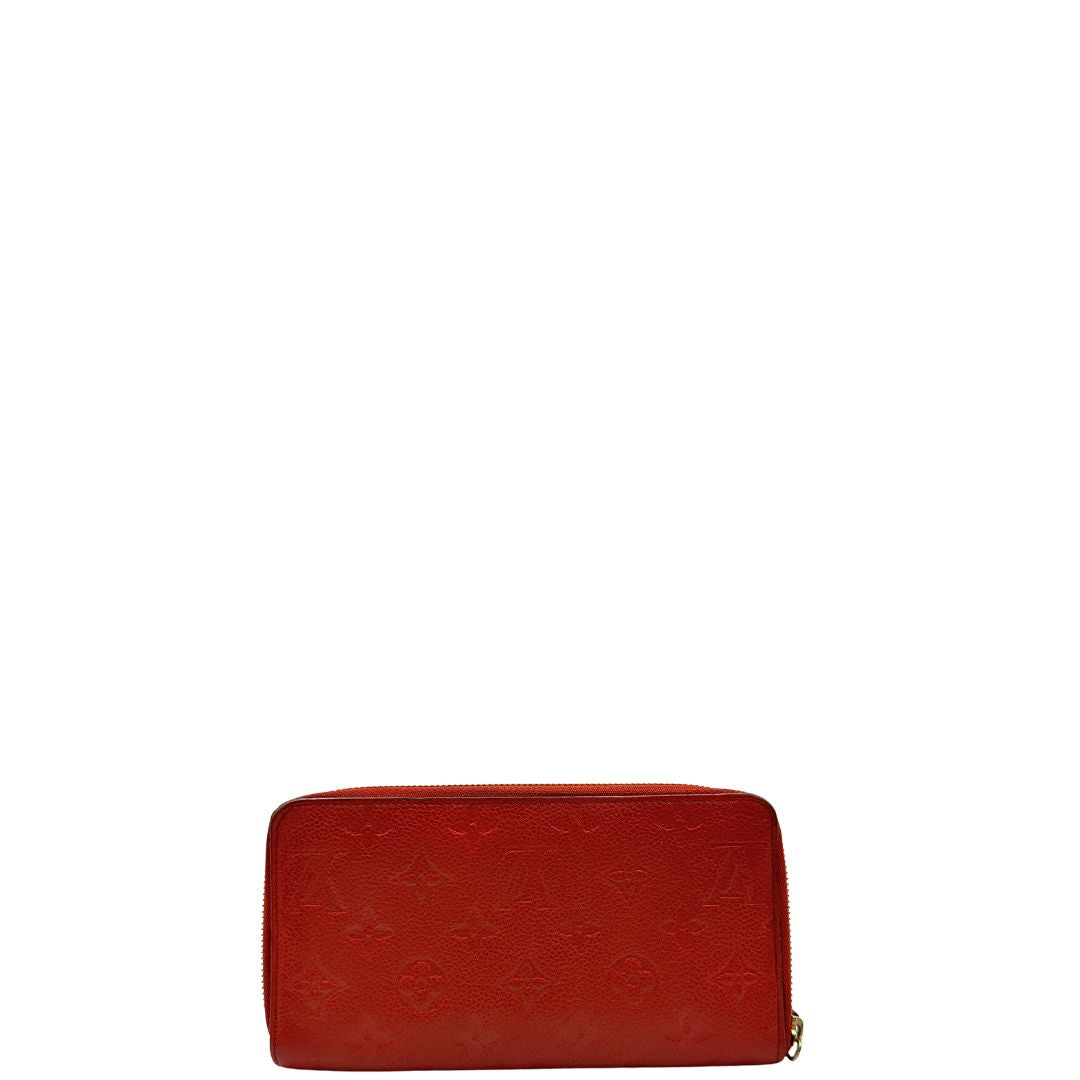 Portadocumenti Louis Vuitton in pelle monogram rossa, di lusso, originale, ottime condizioni, usato.