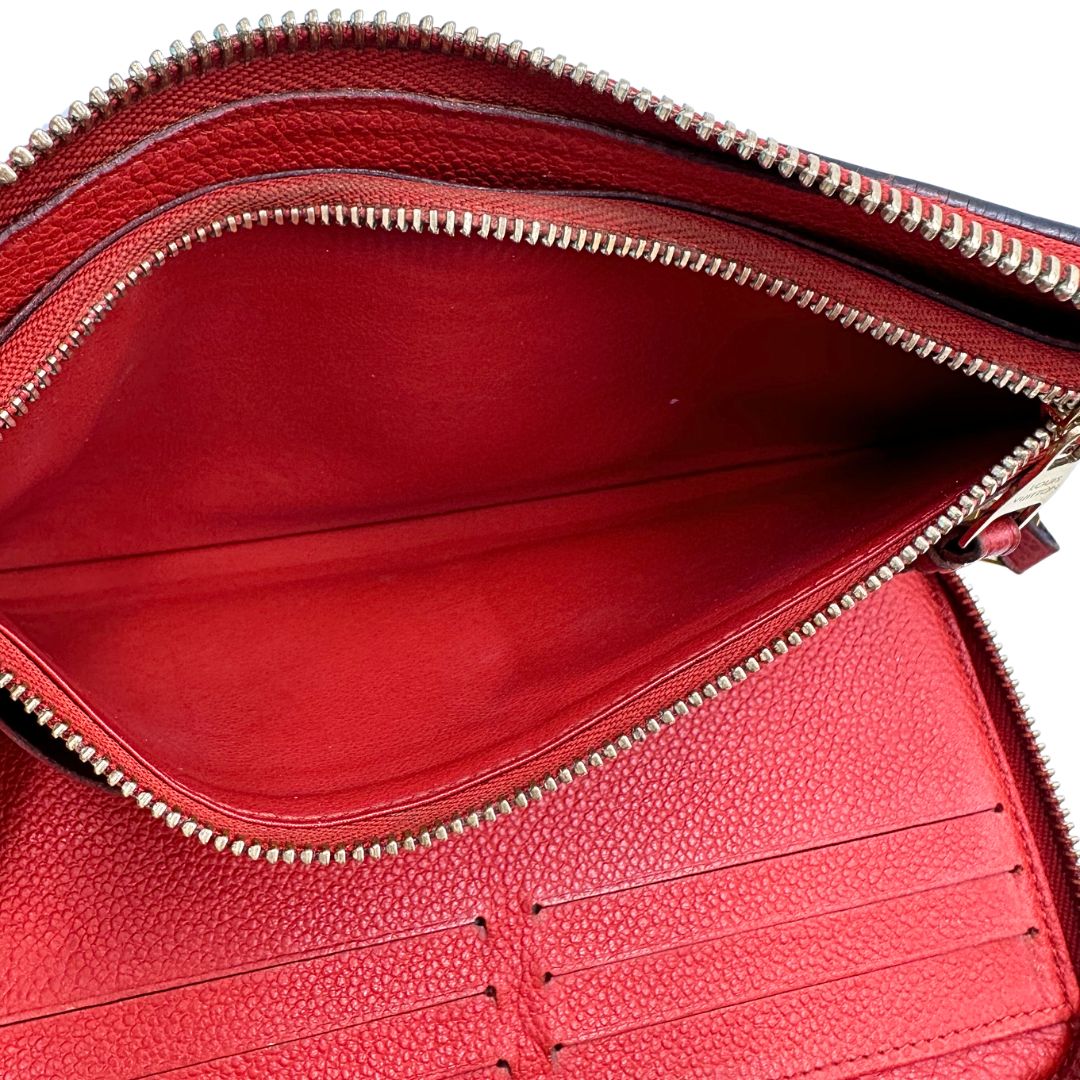 Portadocumenti Louis Vuitton in pelle monogram rossa, di lusso, originale, ottime condizioni, usato.