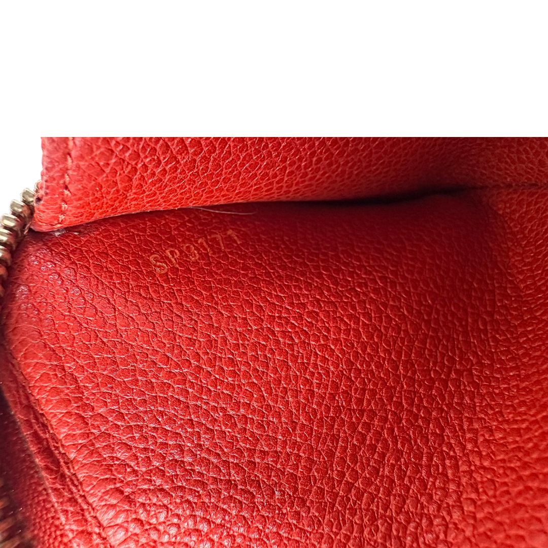 Portadocumenti Louis Vuitton in pelle monogram rossa, di lusso, originale, ottime condizioni, usato.