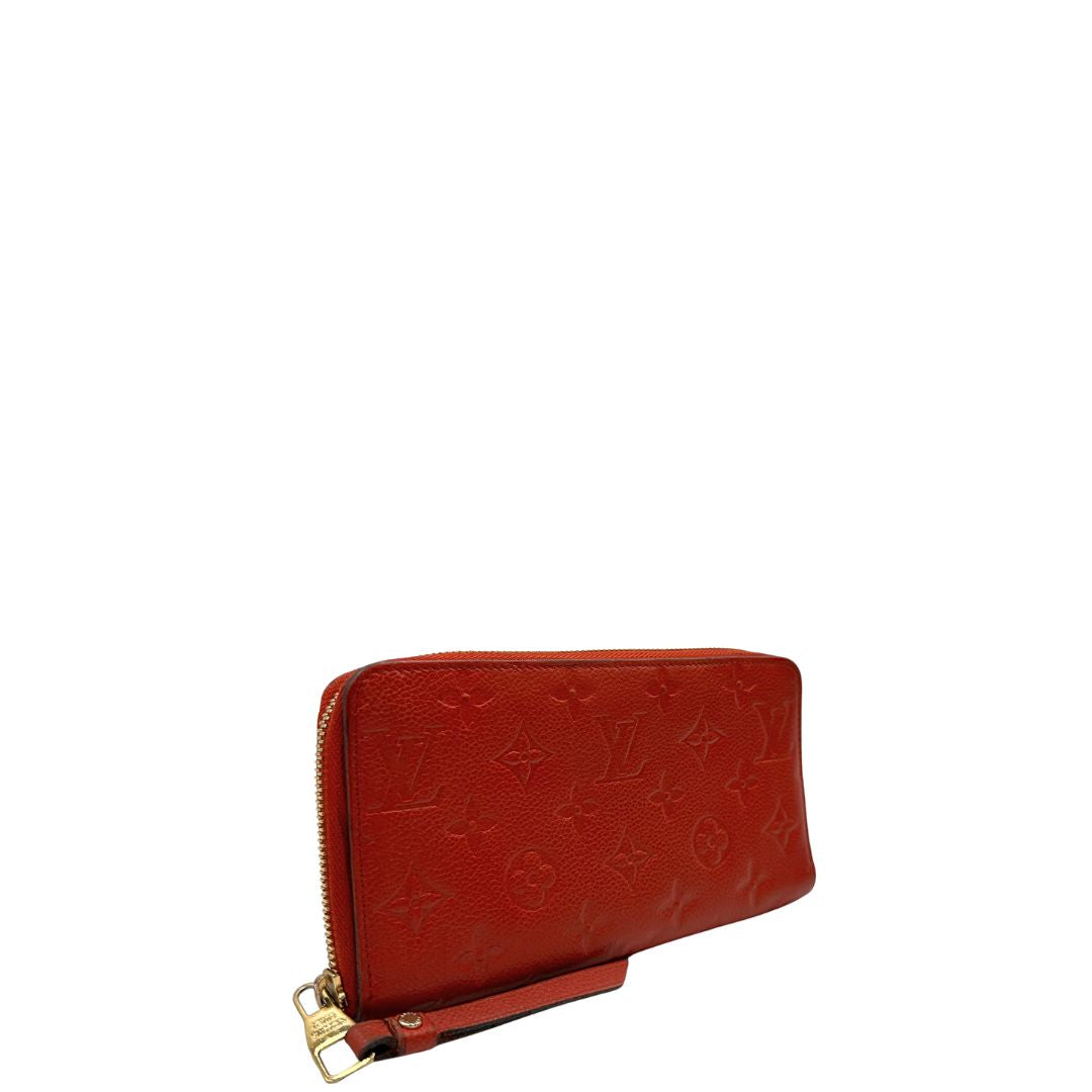Portadocumenti Louis Vuitton in pelle monogram rossa, di lusso, originale, ottime condizioni, usato.