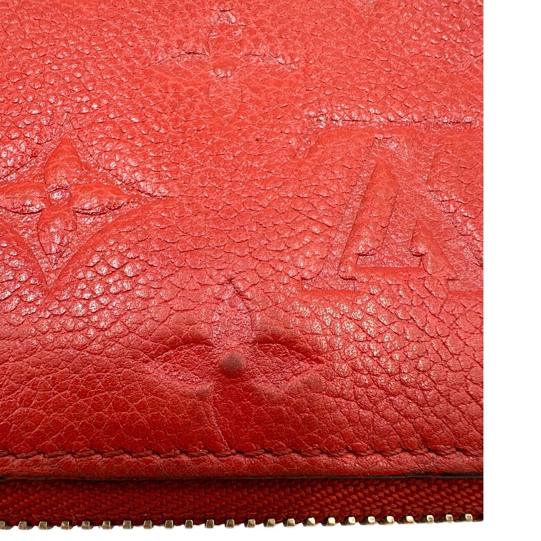 Portadocumenti Louis Vuitton in pelle monogram rossa, di lusso, originale, ottime condizioni, usato.