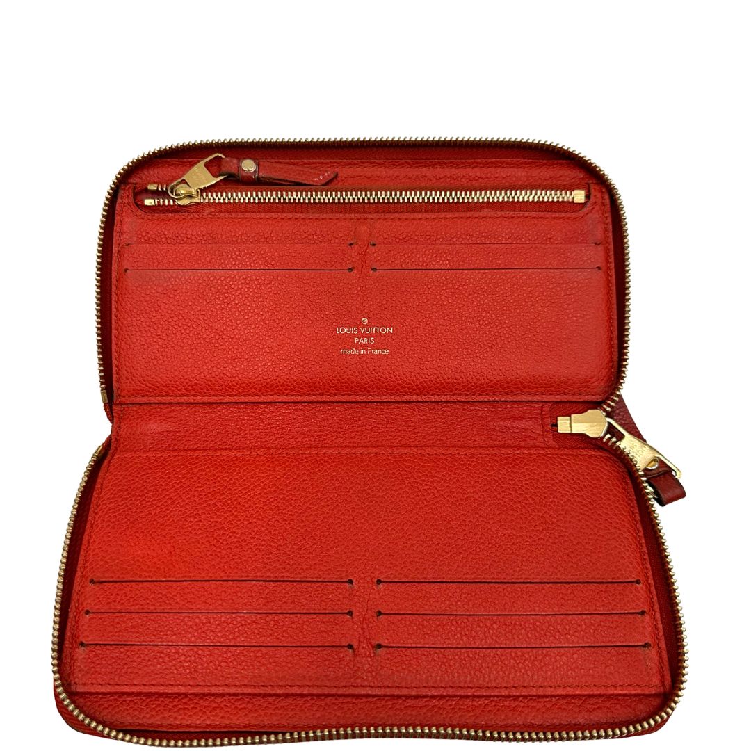 Portadocumenti Louis Vuitton in pelle monogram rossa, di lusso, originale, ottime condizioni, usato.