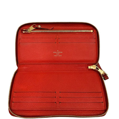 Portadocumenti Louis Vuitton in pelle monogram rossa, di lusso, originale, ottime condizioni, usato.