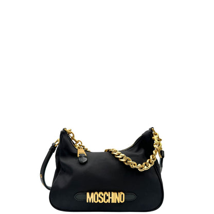 front Borsa Moschino in nylon nero, munita di un manico singolo e una tracolla amovibile e regolabile, di lusso, originale, ottime condizioni, usata. 