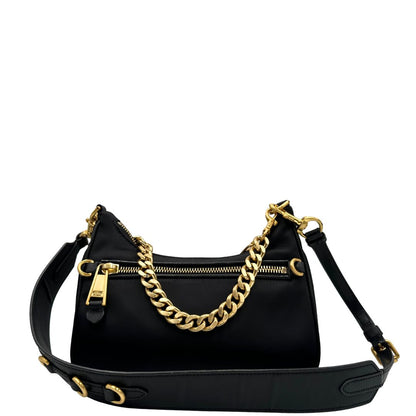 retro Borsa Moschino in nylon nero, munita di un manico singolo e una tracolla amovibile e regolabile, di lusso, originale, ottime condizioni, usata. 