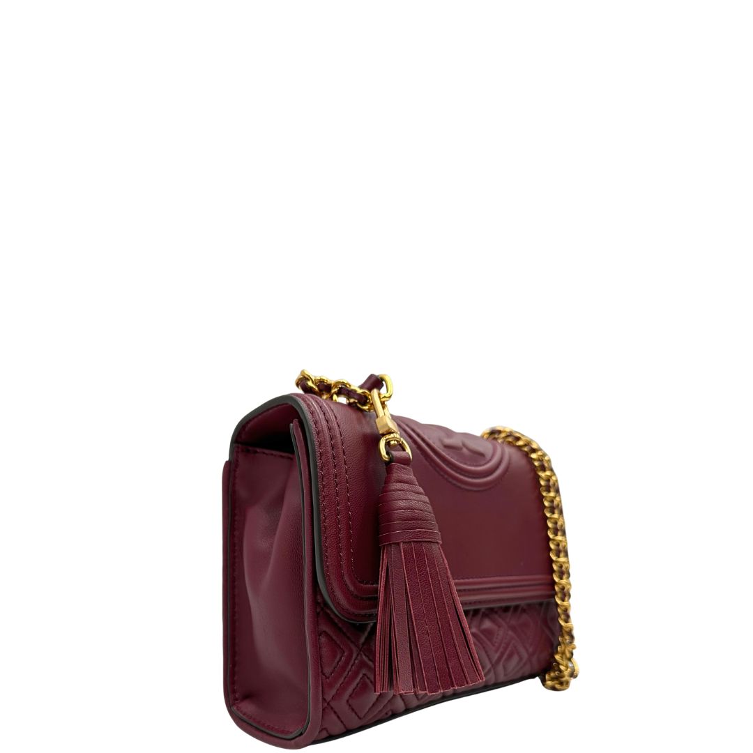 lato  Borsa Tory Burch in pelle bordeaux e hardware dorato, di lusso originale, usata. 
