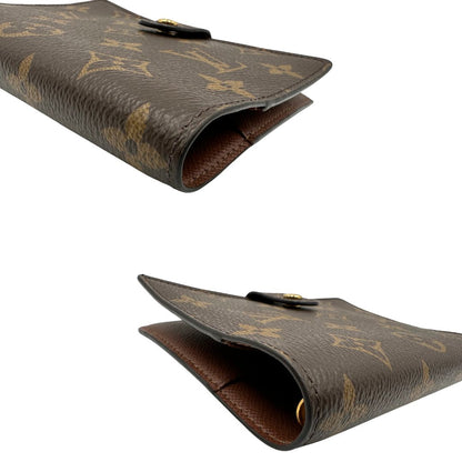 Copertina Louis Vuitton in canvas Monogram per agenda piccola con chiusura a pressione, di lusso, originale, ottime condizioni, usata.