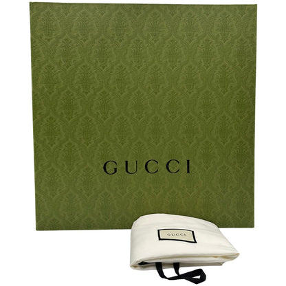 Corredo di un maxi zaino Gucci in tela e pelle nera, dalla colorata tra GG Supreme, usato, originale, second hand, in condizioni eccellenti.