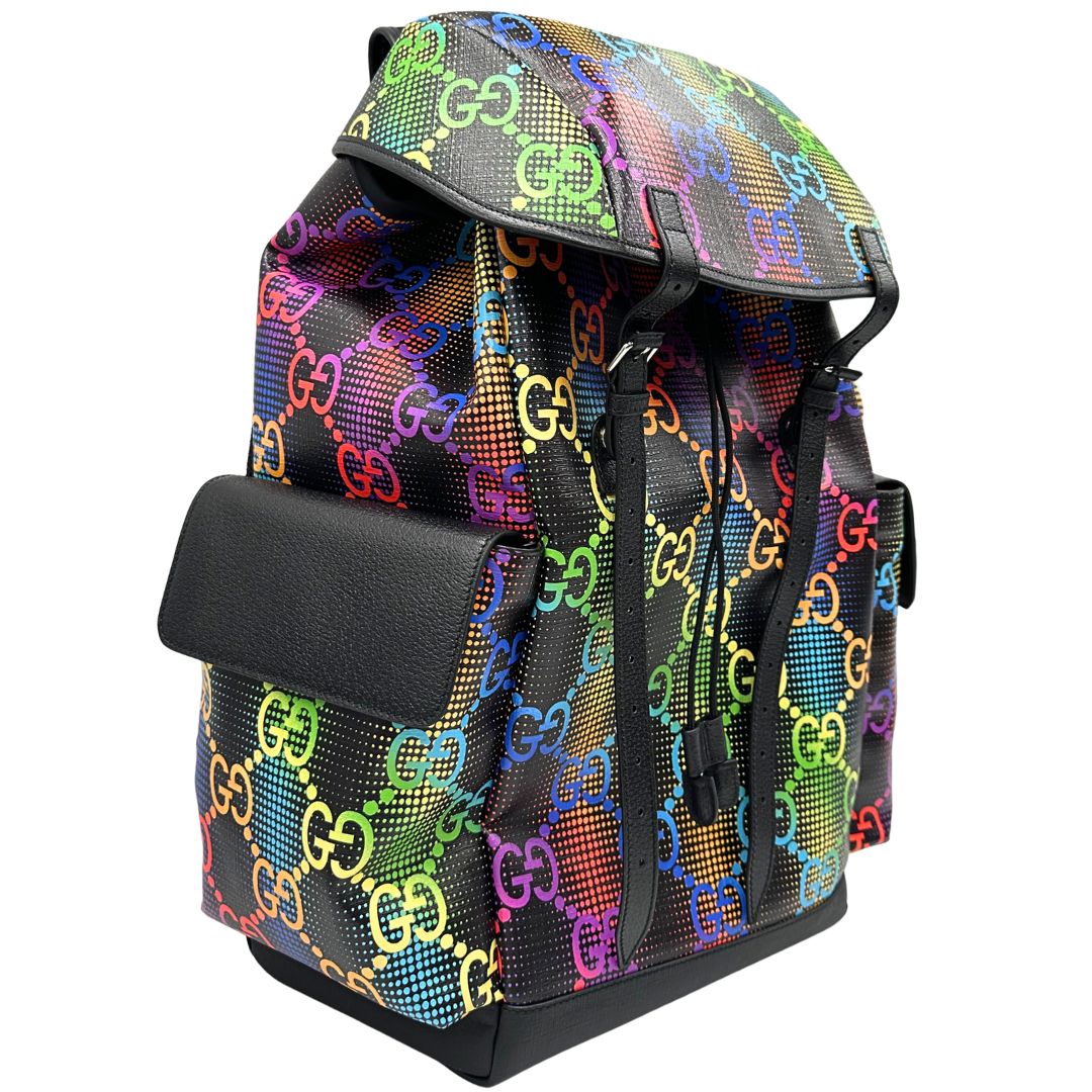 Laterale sinistro di un maxi zaino Gucci in tela e pelle nera, dalla colorata tra GG Supreme, usato, originale, second hand, in condizioni eccellenti.