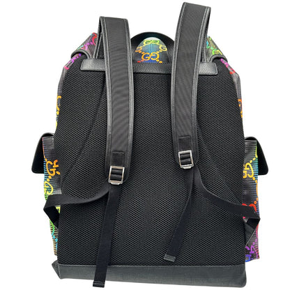 Retro di un maxi zaino Gucci in tela e pelle nera, dalla colorata tra GG Supreme, usato, originale, second hand, in condizioni eccellenti.