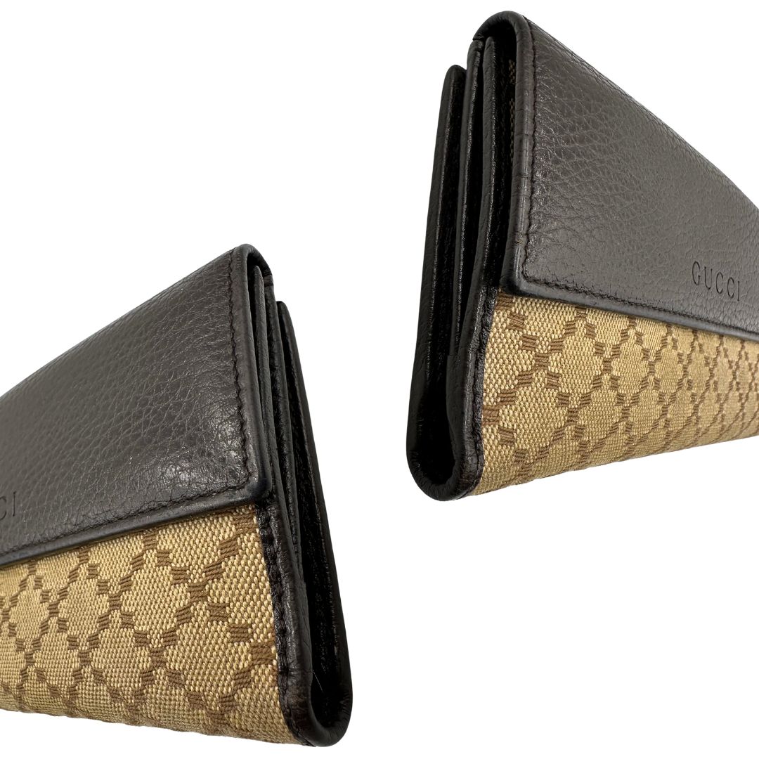 Portafoglio Gucci in pelle marrone e tessuto beige; munito di scatola, di lusso, originale, ottime condizioni, usato.