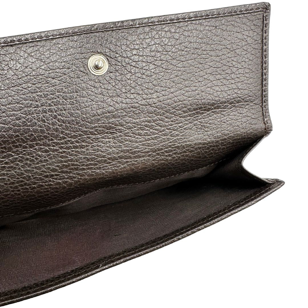 interno Portafoglio Gucci in pelle marrone e tessuto beige; munito di scatola, di lusso, originale, ottime condizioni, usato. 