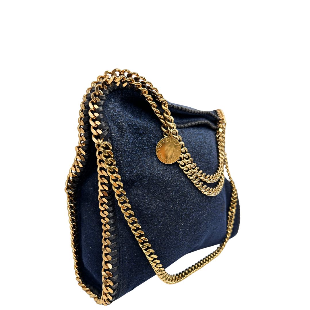 lato Borsa Falabella nella versione fold over tote in feltro blu e hardware dorato, di lusso, originale, ottime condizioni.
