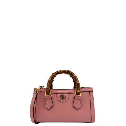front Borsa Gucci in pelle rosa, impreziosita da doppi manici bamboo e doppia G sul front in metallo dorato, di lusso, eccellenti condizioni. 