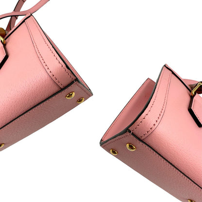 angoli Borsa Gucci in pelle rosa, impreziosita da doppi manici bamboo e doppia G sul front in metallo dorato, di lusso, eccellenti condizioni. 