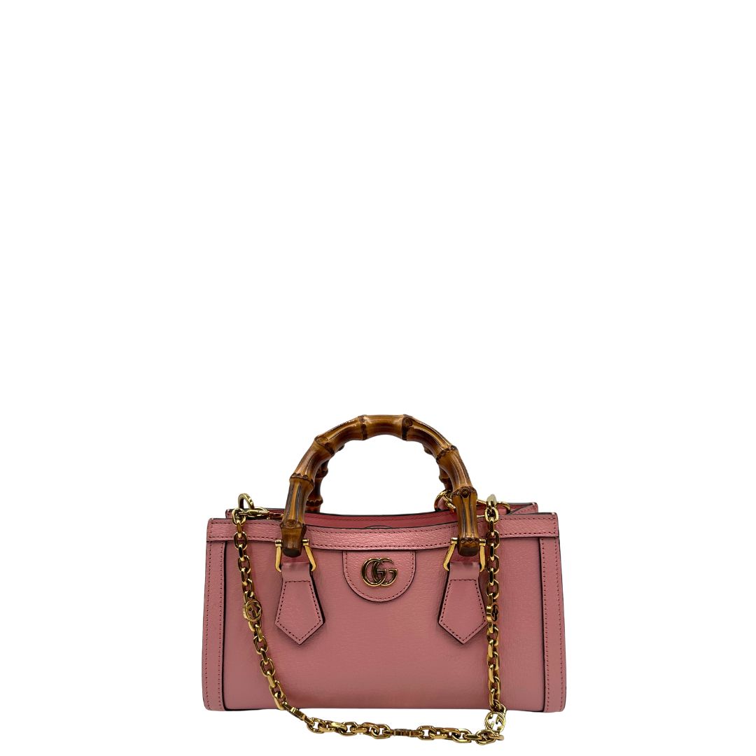 front Borsa Gucci in pelle rosa, impreziosita da doppi manici bamboo e doppia G sul front in metallo dorato, di lusso, eccellenti condizioni. 