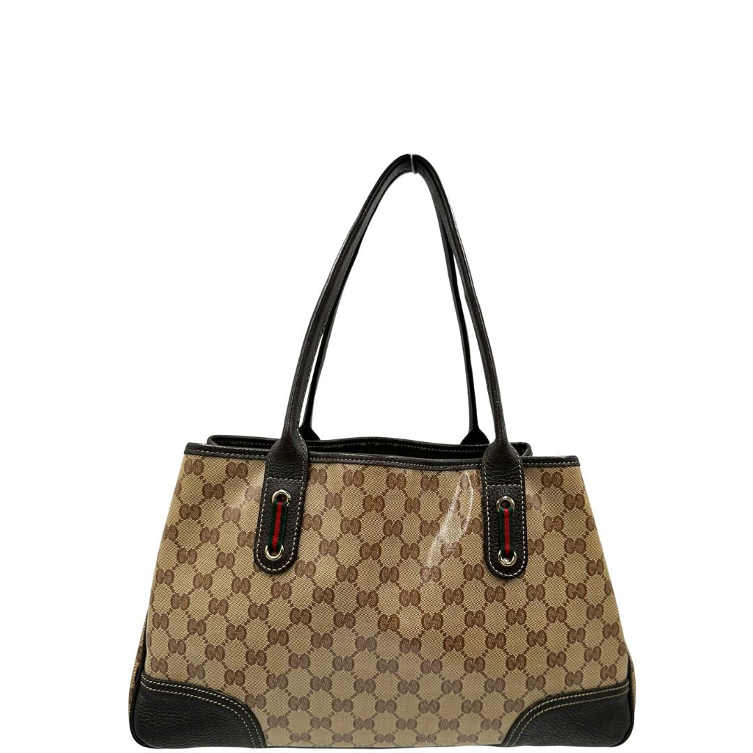 retro Borsa Gucci in tela cerata GG con finiture in pelle marroni, munita di doppi manici in pelle, impreziosita da dettagli Web verdi e rossi, di lusso, originale, ottime condizioni, usata. 