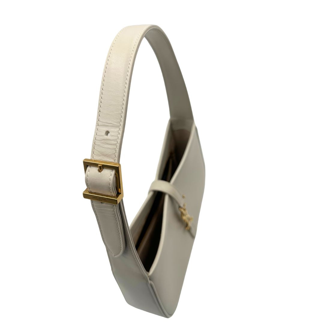 manico Borsa Saint Laurent LE 5 À 7 in pelle bianca, compatta e spaziosa, puoi portarla a mano o a spalla, di lusso, originale, ottime condizioni, usata. 