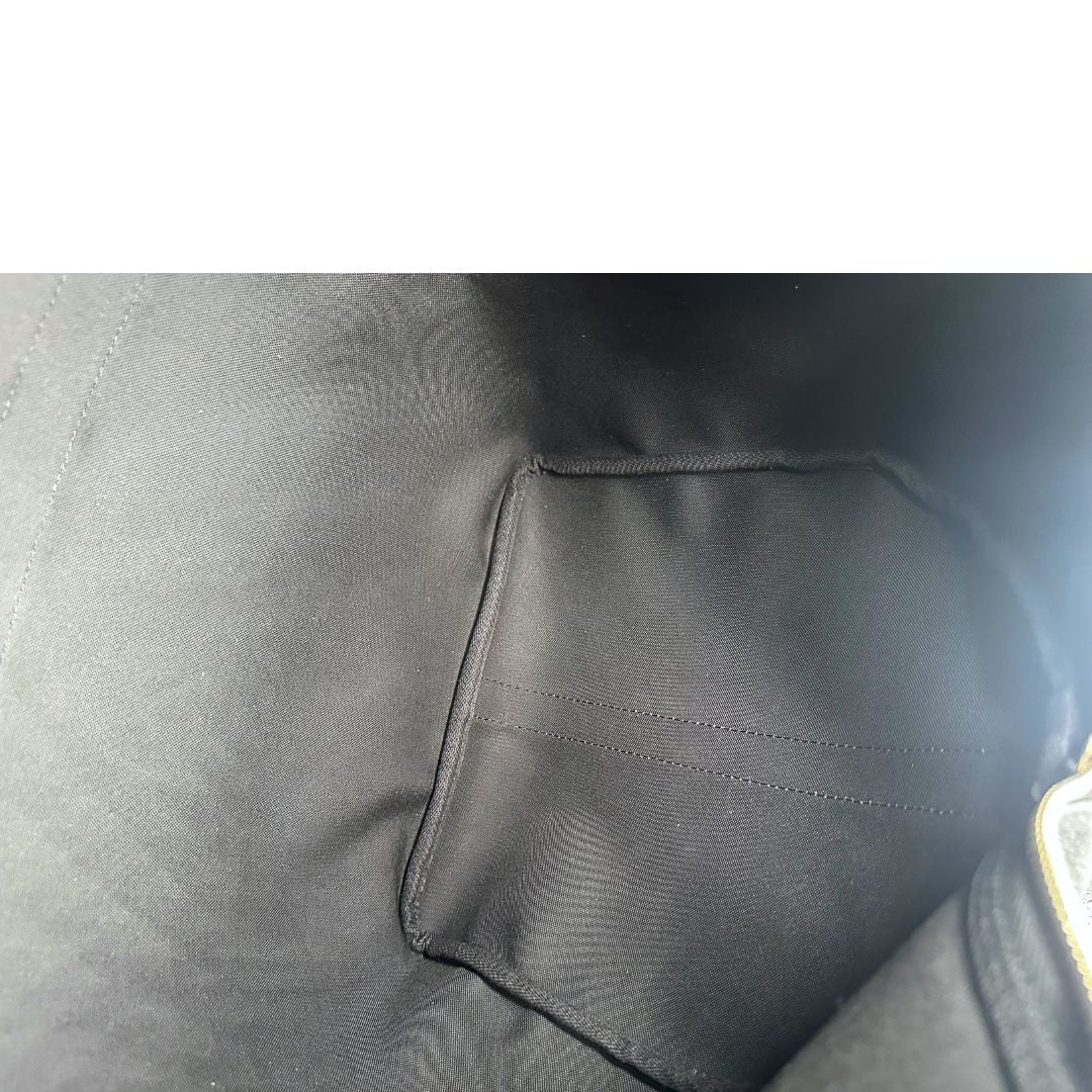 interno Borsone Louis Vuitton Keepall in tela Damier Graphite con stampa artistica nei toni del blu, di lusso, originale, ottime condizioni, usato. 