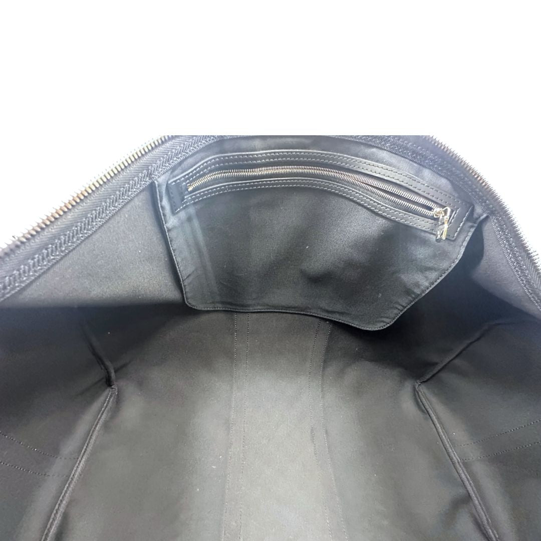 interno Borsone Louis Vuitton Keepall in tela Damier Graphite con stampa artistica nei toni del blu, di lusso, originale, ottime condizioni, usato. 