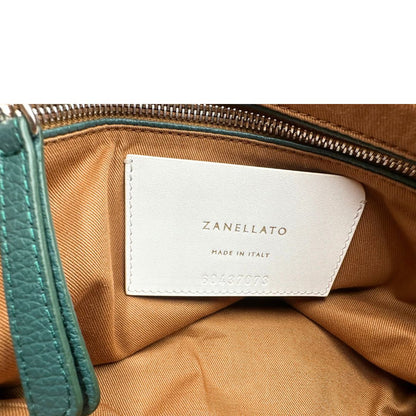 interno  Postina M Zanellato color verde petrolio munita di una tracolla amovibile e regolabile e un manico singolo, di lusso, originale, ottime condizioni, usata. 