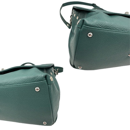 angoli  Postina M Zanellato color verde petrolio munita di una tracolla amovibile e regolabile e un manico singolo, di lusso, originale, ottime condizioni, usata.