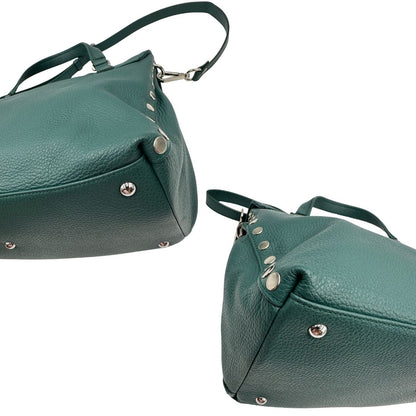 angoli  Postina M Zanellato color verde petrolio munita di una tracolla amovibile e regolabile e un manico singolo, di lusso, originale, ottime condizioni, usata. 