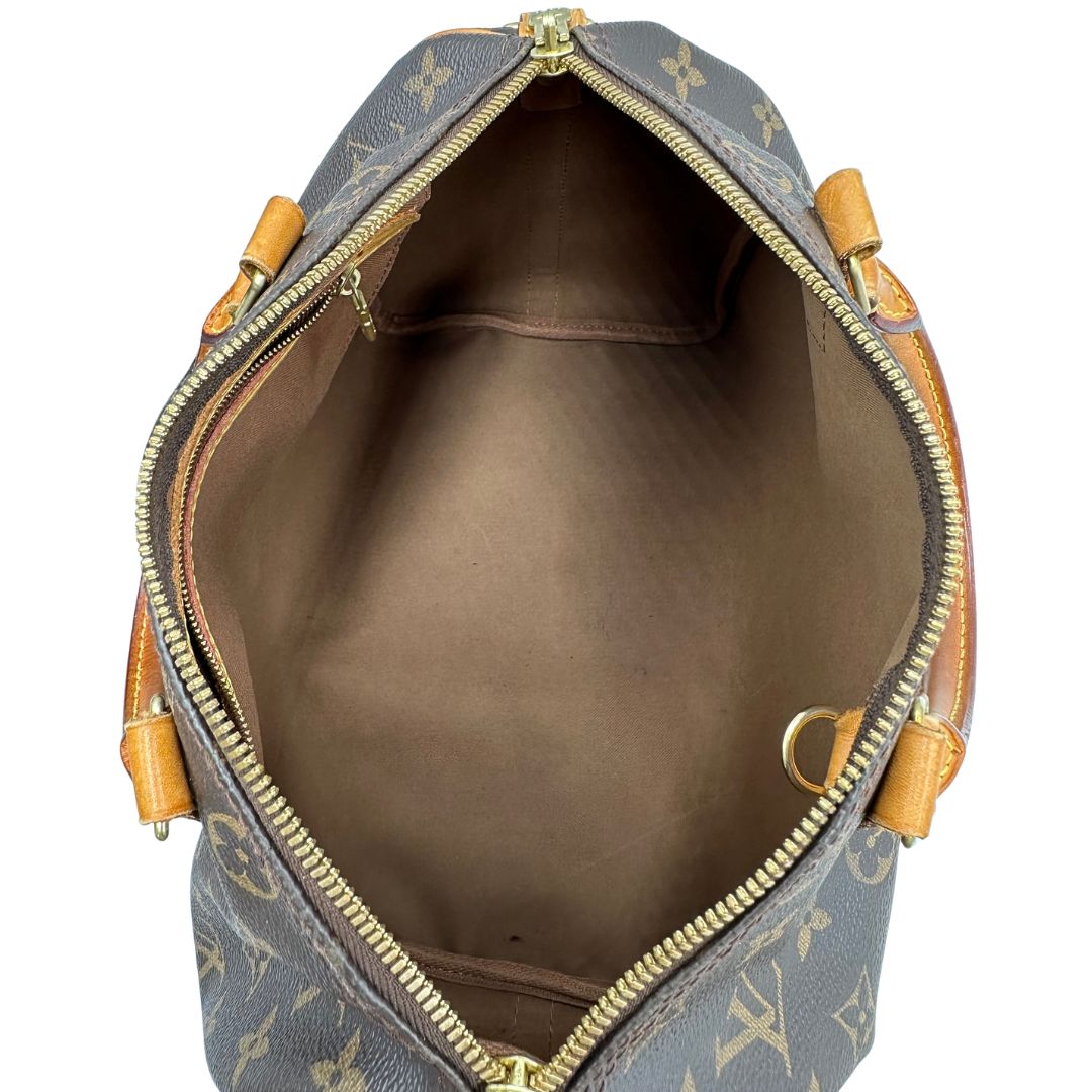 interno  Bauletto Speedy 25 LV Bandoulière in canvas marrone monogram; da portare a spalla, a mano o a tracolla, di lusso, originale, ottime condizioni, usata.