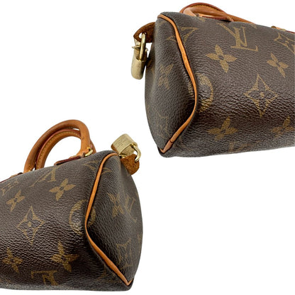Angoli di uno Speedy Nano Louis Vuitton in canvas marrone monogram, usato, originale, second hand, in ottime condizioni.