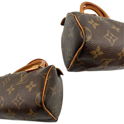Angoli di uno Speedy Nano Louis Vuitton in canvas marrone monogram, usato, originale, second hand, in ottime condizioni.