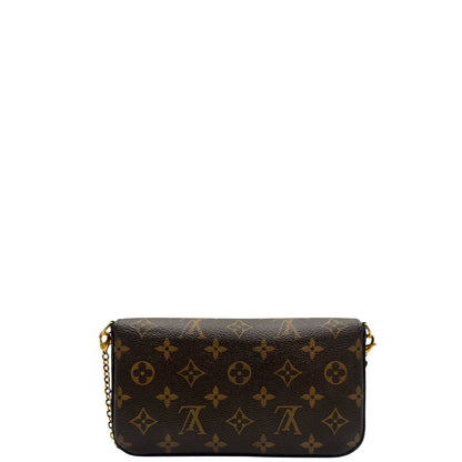Retro di una tracolla Louis Vuitton in canvas marrone monogram ed amaranto, con parti metalliche dorate. Munita di una tracolla in catena amovibile, ma non regolabile e di accessori estraibili portamonete e portacarte, usata, originale, second hand, in ottime condizioni.