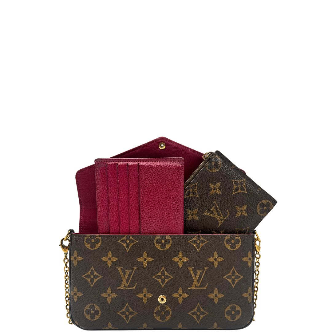 Front di una tracolla Louis Vuitton in canvas marrone monogram ed amaranto, con parti metalliche dorate. Munita di una tracolla in catena amovibile, ma non regolabile e di accessori estraibili portamonete e portacarte, usata, originale, second hand, in ottime condizioni.