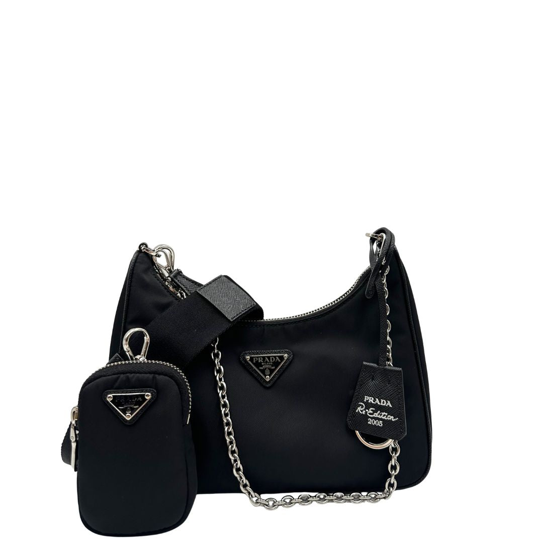 Borsa Prada in re-nylon nero con finiture in pelle saffiano tono su tono, di lusso, originale