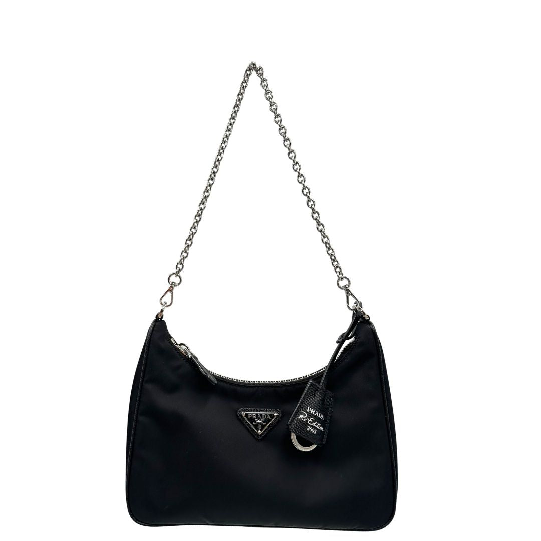 Borsa Prada in re-nylon nero con finiture in pelle saffiano tono su tono, di lusso, originale