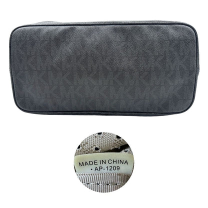 Borsa MK in pelle nera traforata e logata con hardware dorato, munita di doppi manici, da portare a spalla, di lusso, originale, ottime condizioni