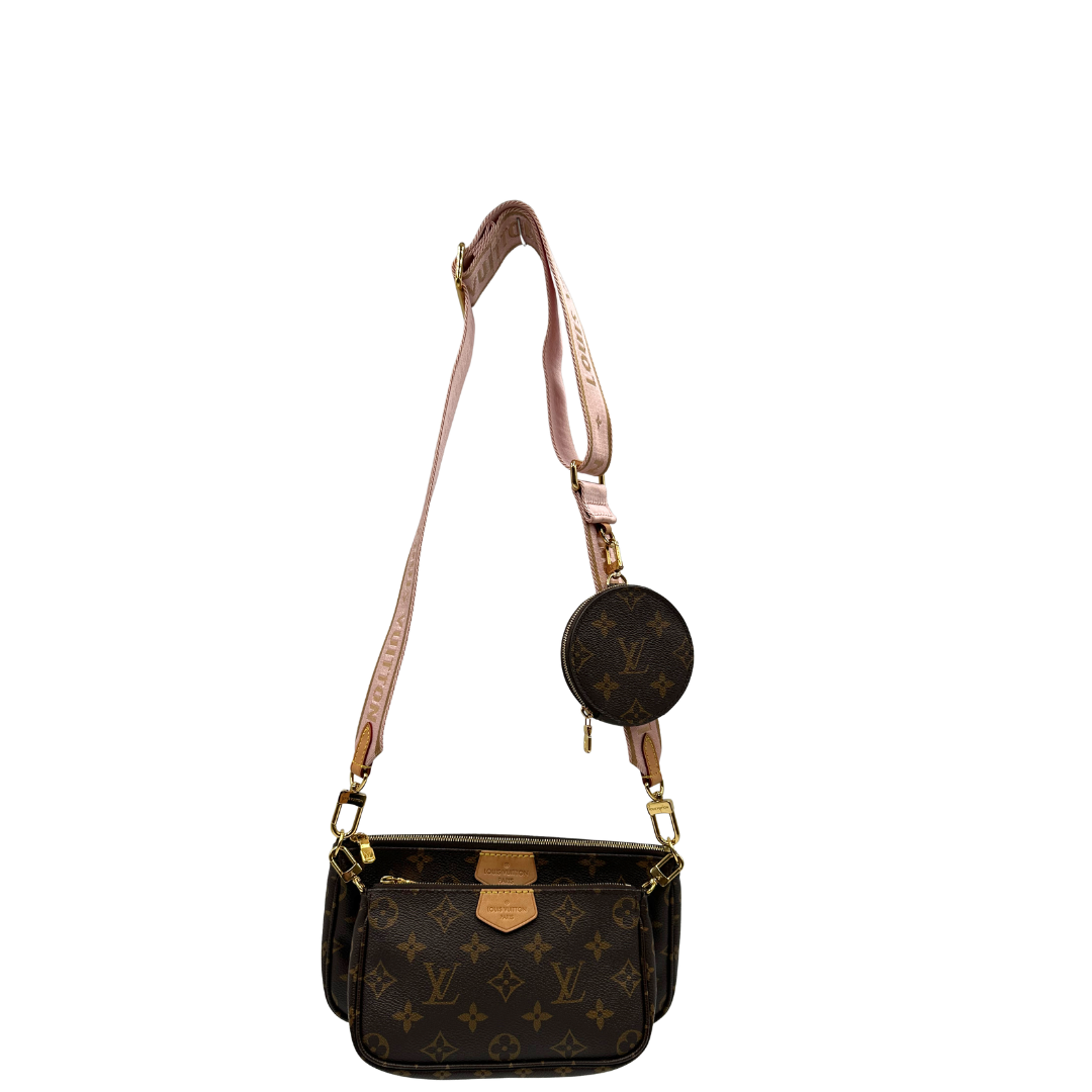 Front di una Multi Pochette Accessoires Louis Vuitton in canvas marrone monogram con dettagli in vacchetta naturale, manico in catena dorata e tracolla in tessuto Jacquard rosa, usata, originale, second hand, in ottime condizioni.