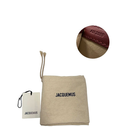 dustbag  Borsa Jacquemus nella versione Le Grand Bambino in pelle color burgundy, da portare a mano o a tracolla, di lusso, originale, ottime condizioni, usata
