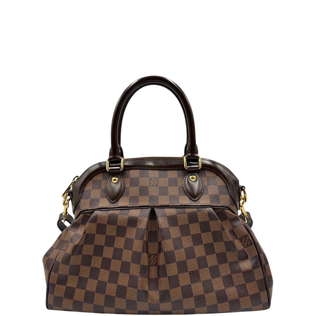 Front di una borsa LV in canvas Damier Ébène nella versione MM, con dettagli metallici dorati, usata, originale, second hand, in ottime condizioni.