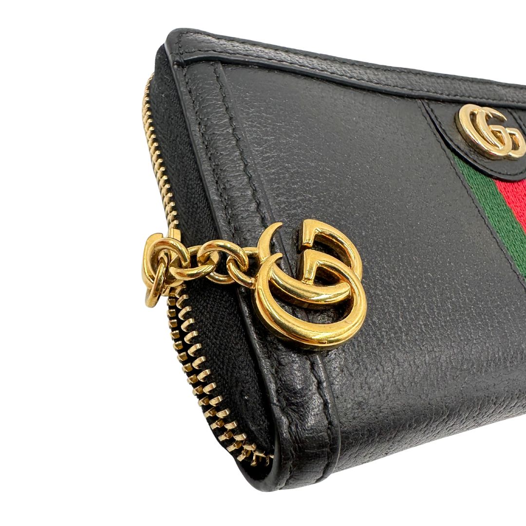 angoli  Portafoglio Gucci in pelle nera impreziosito da striscia Web verde rossa, di lusso, originale, ottime condizioni, usato 