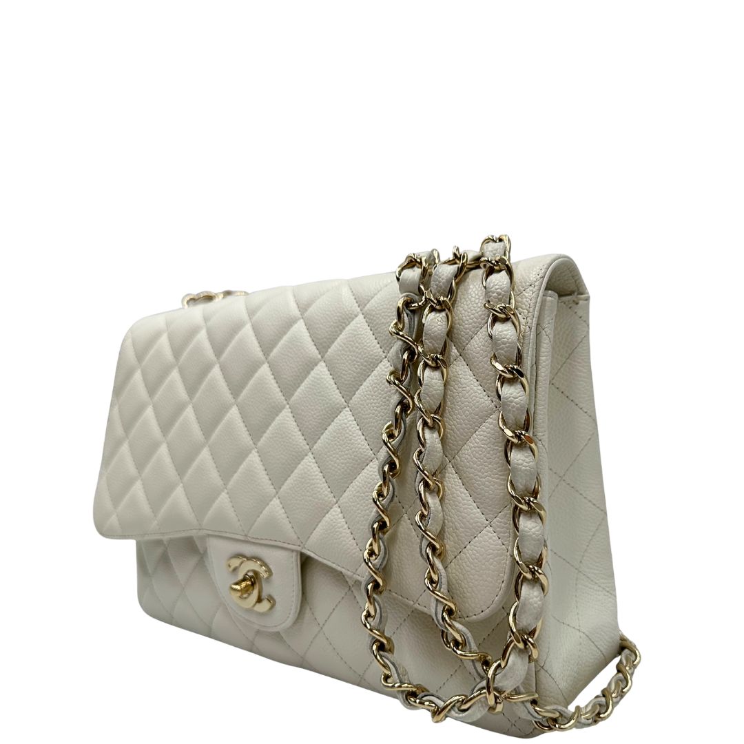 lato  Borsa Chanel linea Timeless, in pelle caviar bianca, di lusso, originale, ottime condizioni, usata 