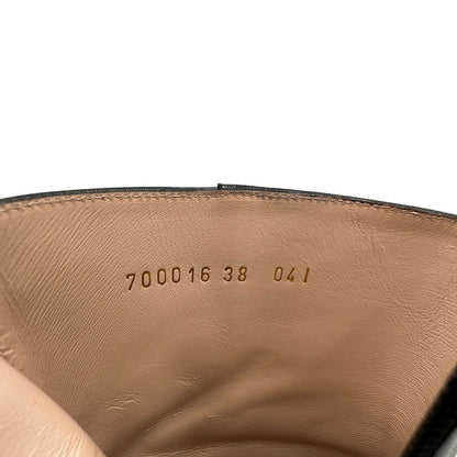 Codice di un paio di stivaletti Gucci in pelle nera, con iconico dettaglio Soho in metallo dorato, usati, originali, second hand, in ottime condizioni.
