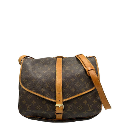 Front, Borsa Saumur LV monogram nella misura 35 realizzata in canvas monogram e finiture in vacchetta naturale. Originale, usata, di lusso, in ottime condizioni.