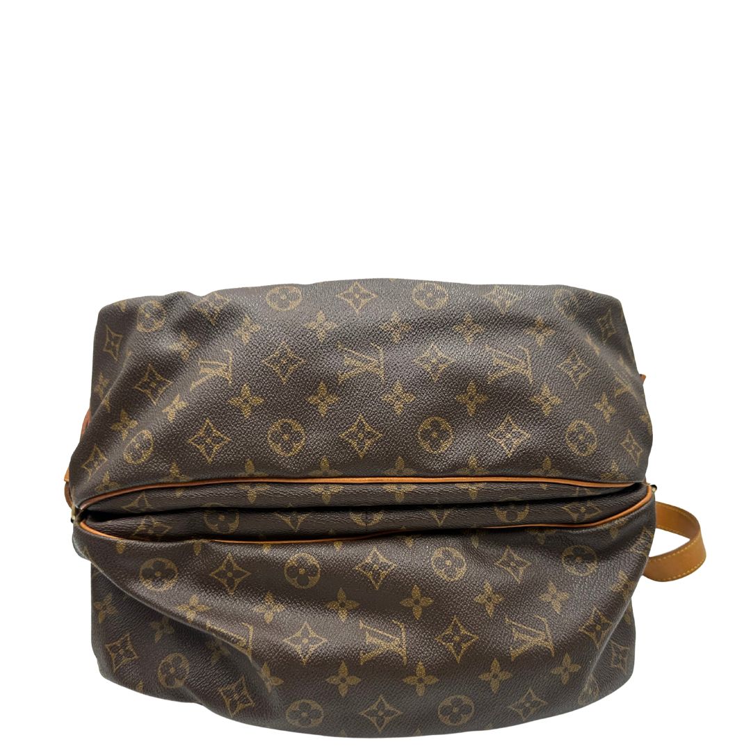 Base, Borsa Saumur LV monogram nella misura 35 realizzata in canvas monogram e finiture in vacchetta naturale. Originale, usata, di lusso, in ottime condizioni.