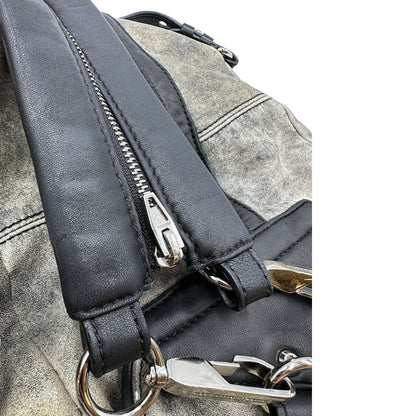 Manico apribile Zaino Marti in pelle verde oliva effetto washed e finiture nere con hardware argentato. Originale, di lusso, usato, in condizioni ottime. 