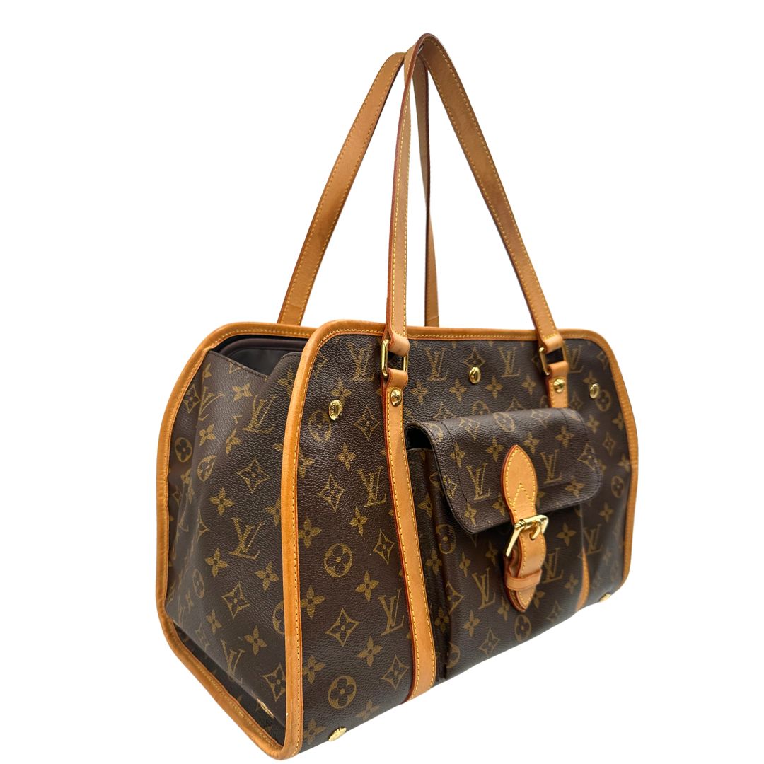 lato Trasportino LV Baxter nella versione GM realizzato in canvas monogram e finiture in vacchetta naturale, di lusso, originale, ottime condizioni, usato 